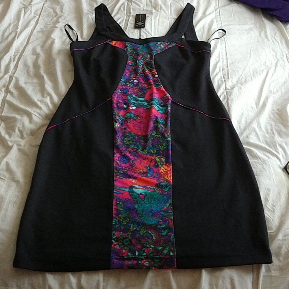 Kim Kardashian black mini dress with neon inlet